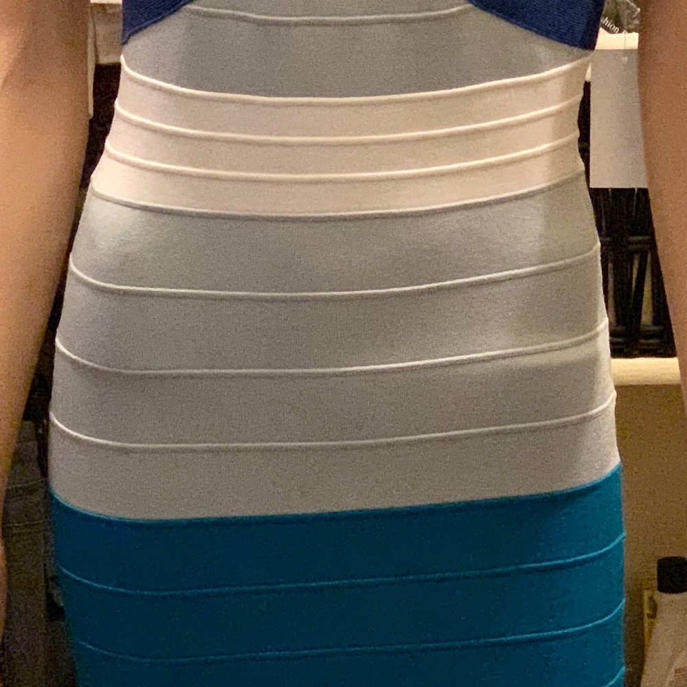 Never worn, multi-colored, SLIMMING dress!